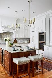 There is a poll below about which of the colored cabinets. White Painted Kitchen With Contrasting Island Crystal Cabinets