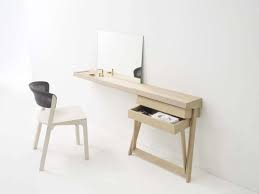 Minimalist Design Of The Vanity Table With Drawers And Mirror Made Of Floating Wall Mounted Desk Dressing Table Design Simple Furniture Design Furniture Design