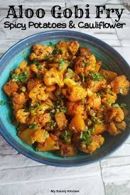 Aloo Gobi Spiced Potatoes Cauliflower My Dainty Kitchen Recipe In 2020 Aloo Gobi Indian Food Recipes Vegan Curry Recipes