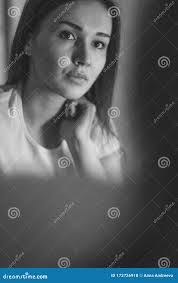 Closeup of a Beautiful Seductive Girl Holding a Hand Near Her Face. Stock  Photo