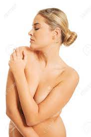 Portrait Of Nude Woman Covering Her Breast With Cross Hands Stock Photo,  Picture and Royalty Free Image. Image 34390033.