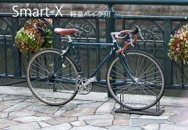 楽天市場 アイアン自転車スタンド 26 27インチ用 スマートエックス smart x ホワイト ブラック ブラウン 自転車スタンド バイクスタンド 自転車収納 自転車置場 コロナ対策 鉄の重さで支える自転車スタンド 工事不要 マンション アパート 賃貸 ディス プリズム
