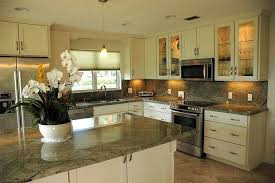 Green Kitchen Cabinets And White Countertops The Complete Bosch Appliance Package From Je Green Granite Countertops Kitchen Marble Marble Countertops Kitchen