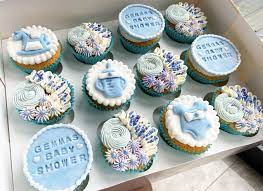 Baby Boy Baby Shower Cupcakes In Blue Purple And White Bright Blue Cases Buttercream Stamped Royal Icing And Baby Boy Cupcakes Cupcakes For Boys Blue Cupcakes