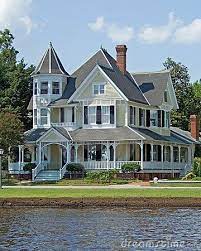 This Grand Victorian Has Queen Anne Features To It S Architectural Style Turret And On The Water How Victorian Homes Architecture House Wrap Around Porch