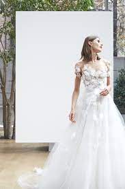 As a special thank you, we've sent you an email with a promo code that you can use on your next order. Oscar De La Renta Bridal Wedding Dress Collection Spring 2018 Glamour