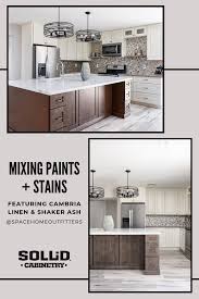 We Love Mixing Paints And Stains In Kitchens Just Like This Cambria Linen And Shaker Ash Combo Custom Bathroom Custom Bathroom Vanity Custom Kitchen Cabinets