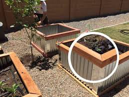 A raised garden bed helps control the soil and keeps your garden tidy. How To Make Diy Raised Garden Beds With Corrugated Metal