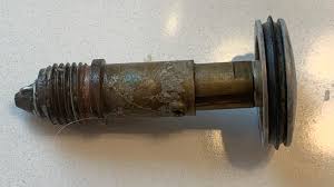 If it's truly stuck, you might have to replace the entire drain assembly. Preventing Push Spring Drain Stoppers From Getting Stuck Home Improvement Stack Exchange