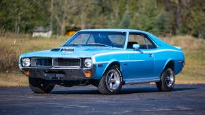Finished in dark red with gold stripes over a black interior, the car is powered by a 401ci v8 that was reportedly rebuilt in 2019 with wiseco. 1970 Amc Javelin Sst Mark Donohue Edition S2 2 Kissimmee 2018