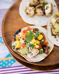 Fish tacos appears in naomi's newest cookbook, perfect flavors, published by artscroll mesorah publications. Fish Tacos With Chunky Guacamole And Mango Salsa Cafe Johnsonia