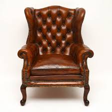 Large Antique Leather Wing Back Armchair At Marylebone Antiques This Is A Large Extremely Comfortable Antique Leather Winged Armchair Antique Chairs Chair