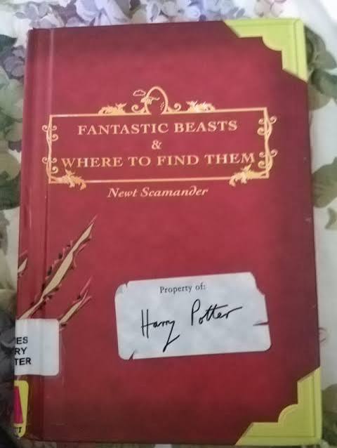 We found the original edition of "Fantastic Beasts and Where to Find Them".  I wish they had kept all the funny graffiti in the reissued edition... :  r/harrypotter