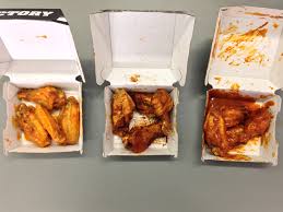 Garlic buffalo wing sauce with plenty of garlic powder and butter is a tasty and rich addition to chicken wings. Buffalo Wild Wings All Sauces And Seasonings Reviewed And Ranked Stl Wing Review