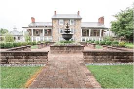 Set amidst 10 sprawling acres of lush gardens. The Farmhouse At The Grand Colonial Wedding Photos