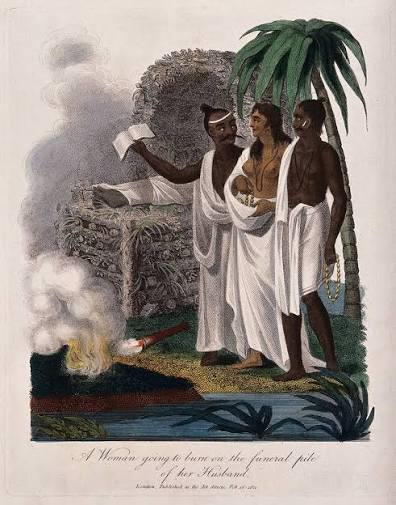 An Indian widow being led to suttee. Coloured etching, 1811. | Wellcome Collection
