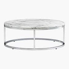 Terrazzo stone shapes up as the perfect host for books, mags and snacks. Smart Round Marble Top Coffee Table Reviews Cb2