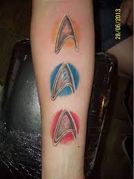 Unlike women, who often make a star trek tattoo for couples on the lower back, the men take advantage of the top, particularly the blade area and the latissimus dorsi. Colorful Star Trek Tattoo By Dannewsome