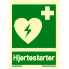 Placeres ved siden af marker tydeligt med aed hjertestarter skilt. Skilt Hjertestarter Symbol Og Tekst