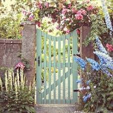 Different Colorful Flowers Garden Gates From Same Are All The Wecolorful Garden Gates We Ar Garden Gate Design Garden Gates And Fencing Garden Gates