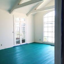 Choosing wall paint colors that will look great with your hardwood flooring can be challenging. My Color Washed Living Room Floor A Beautiful Mess Living Room Flooring Blue Floor Paint Painted Wood Floors