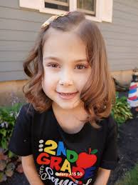 Ava's first time cheering for high school last night! 💙🩵🤍