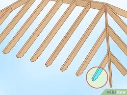 Roof space bracing using a timber brace from the ridge to a braced wall top plate. How To Build A Hip Roof 15 Steps With Pictures Wikihow