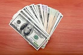 The concept of income, bonuses or bribes. 170 623 Money Table Photos Free Royalty Free Stock Photos From Dreamstime