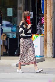 The biggest haircut trends for fall 2020. 201 Dakota Johnson White Sneakers Street Style Spring Summer 2020 Image 1 Sassy Daily Fashion News