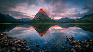 When it comes to beauty nothing can beat the beauty of **nature**. Surreal Sunrise At The Swiftcurrent Lake 5k Hd Nature 4k Wallpapers Images Backgrounds Photos And Pictures