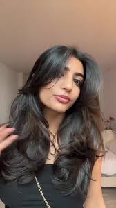 Long Butterfly Haircut with Curtain Bangs Chicago Il