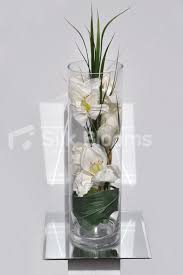This Ivory Amaryllis Vase Display Is Ideal For Decorating Your Home Or For Hotel Foyers And Reception Area Flower Display Vase Arrangements Flower Arrangements