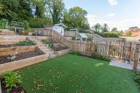 Uk Garden Fence Ideas For Urban Landscapes Homify Sloped Garden Country Garden Design Garden Design