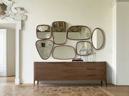Many rooms feature large mirrors that are simply glued directly to the wall without a frame or nails. Porada Mix Wall Mirror By C Ballabio Chaplins