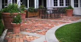 Remove the pipes, and fill in the gaps with more sand. Brick Patios Patio Landscaping Patio Design