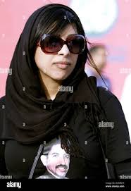 Bahraini anti-government activist Zainab al-Khawaja participates in an  opposition rally outside the United Nations building Wednesday, Feb. 22,  2012, in Manama, Bahrain, demanding freedom for prisoners and democracy. On  her shirt is