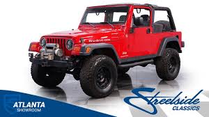 Image result for Flame Red 2005 Jeep