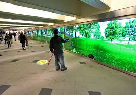 Interactive Digital Signage Wall Brings Play To Nyc Subway Station Screenmedia Daily Digital Signage Wall Digital Signage Wall Signage