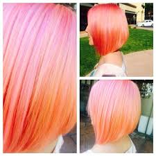 You'll achieve a unique color with a romantic and sophisticated style that will be the envy of all. Pastel Pink And Orange Mix Hair Colors Ideas Pink And Orange Hair Coral Hair Hair Styles
