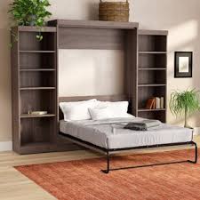 Wall bed set up as bed with bookshelves on initially, i thought wall beds were a fairly recent innovation. Murphy Bed Desk Wayfair