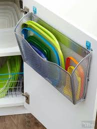 Add A Wall Mounted Bin To The Inside Of A Cupboard Door To Hold Those Smaller Plastic Lids That Keep Ge Home Organization Storage Solutions Diy Kitchen Storage
