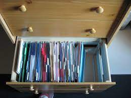 Then flip it so that the bottom of the cabinet is on the side. File Cabinet Drawer Pinching Your Pennies Filing Cabinet Drawer Filing Cabinet Diy Desk