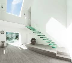 Less is more in this urban home. 20 Glass Staircase Wall Designs With A Graceful Impact On The Overall Decor