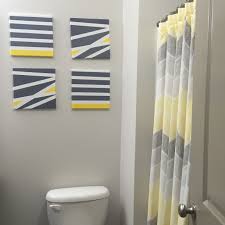 Master Bathroom Yellow And Gray Decor Striped Canvas Art And Chevron Like Shower Curtain Yellow Bathroom Decor Bathroom Art Diy Bathroom Canvas Art