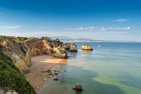 Lagos offers some of the most stunning beaches in the algarve, a rich history, a buzzing café and nightlife scene, and an abundance of natural beauty. Praia Do Pinhao Lagos The Algarve Beaches Portugal Travel Guide