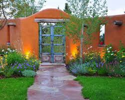 Gate And Wall Adobe New Mexico Classic Mediterranean Landscaping Landscape Design Garden Design