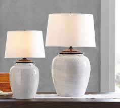 Add warmth & light to any space with a table lamp. Courtney Ceramic Table Lamp Ivory Pottery Barn