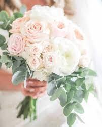 A full round bouquet of white blooms completed the look for a bride who walked down the aisle in the garden of her family's austin home. Pink Perfection Blush Pink And White Beautiful Bouquet Created With Roses Peonies And Eucaly Bridal Bouquet Peonies Bridal Bouquet Pink Pink Peonies Wedding