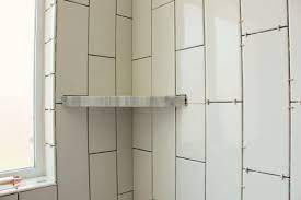 When you install a shower corner shelf, you are doing so on top of another surface. How To Install A Tile Shower Corner Shelf