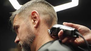 Cutting your own hair at home might sound like a frightening proposal at first. Barber Woman Cuts Bearded Man S Hair With A Clipper In Barbershop Men S Hairstyling And Hair Cutting In Salon Grooming The Hair With Trimmer Hairdresser Doing Haircut In Retro Hair Salon Stock Video